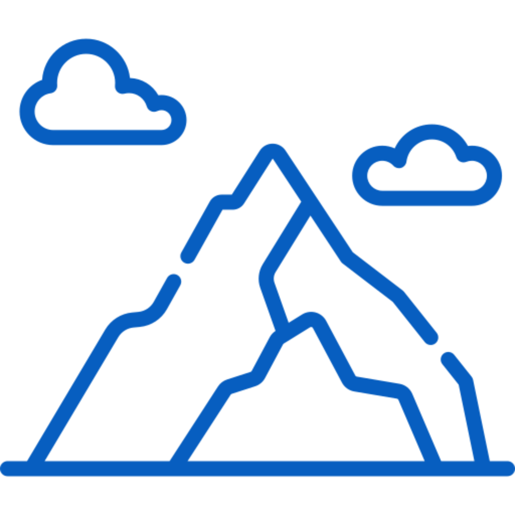 Blue mountain silhouette with clouds on a blue background.