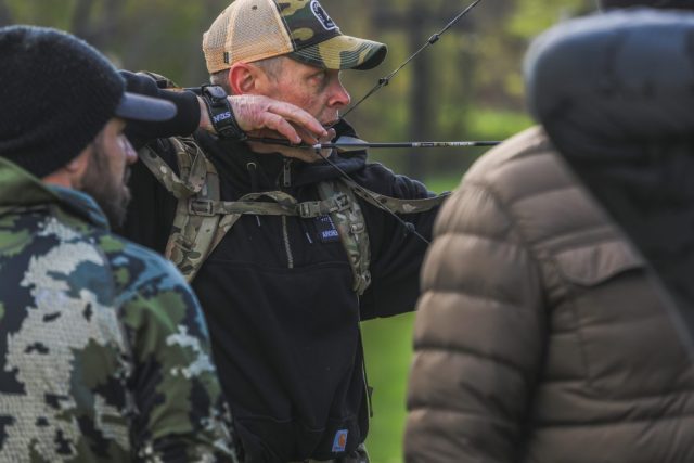 Competitor Brandon Stewart at full draw during the Appalachian Bowhunter Challenge head-to-head bracket at Winterplace Ski Resort West Virginia