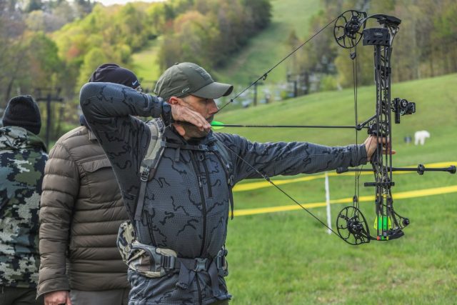 Competitors Ryan Havlicek at full draw during the Appalachian Bowhunter Challenge head-to-head bracket at Winterplace Ski Resort West Virginia