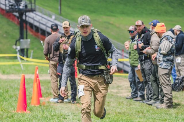2026 Appalachian Bowhunter Challenge competitor Luc LaChance running to grab the sled during the head-to-head event