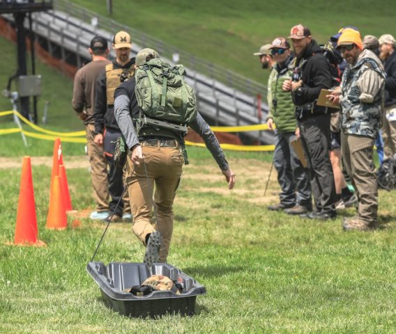 2026 Appalachian Bowhunter Challenge competitor Luc LaChance dragging the sled during the head-to-head event