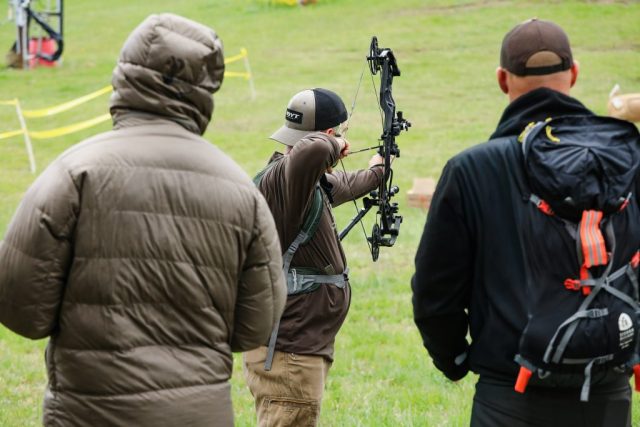 Competitor Daniel Clower at full draw during the Head-to-Head event